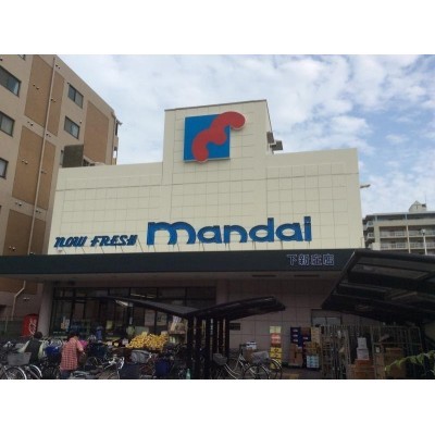万代 下新庄店まで395m