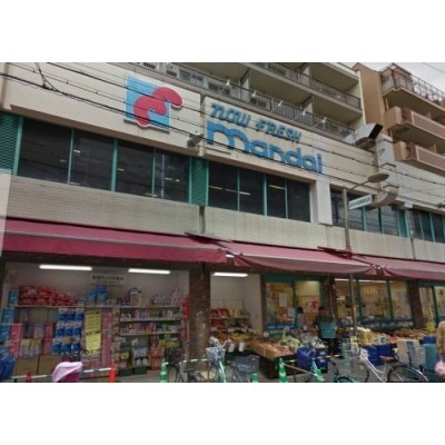 スーパー万代 塚本店まで395m